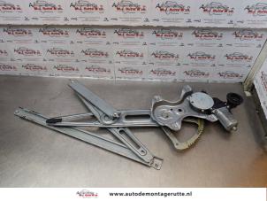 O174581 Gebruikte raammechaniek 4deurs rechts-voor Toyota Yaris