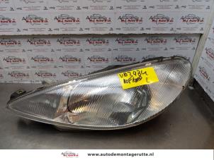 O174605 Gebruikte koplamp links Peugeot 206