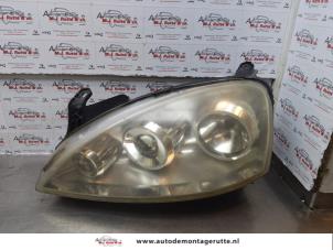 O174655 Gebruikte linker koplamp Opel Corsa