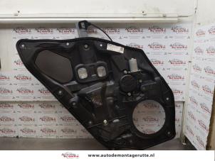 O175121 Gebruikte raammechaniek 4deurs links-achter Mazda 2.