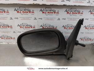 O175167 Gebruikte buitenspiegel links Nissan Micra