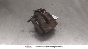 O175207 Gebruikte remklauw (tang) links-achter Opel Astra