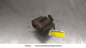 O175208 Gebruikte remklauw (tang) links-achter Opel Astra