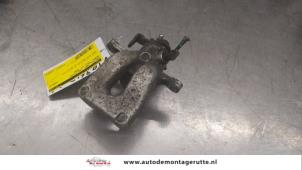 O175437 Gebruikte remklauw (tang) links-achter Renault Modus