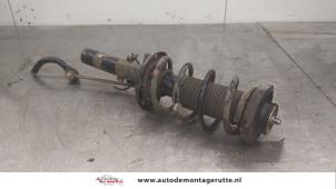 O175457 Gebruikte schokdemperpoot rechts-voor Volkswagen Fox