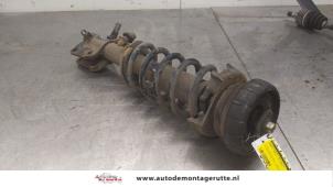 O175599 Gebruikte schokdemperpoot rechts-voor Renault Trafic