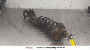 O175604 Gebruikte veerpoot links-voor Opel Vivaro