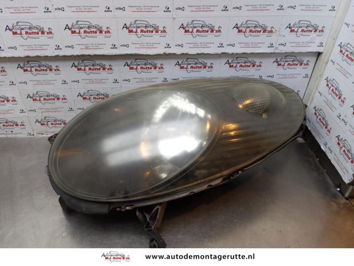 Gebruikte Koplamp links Nissan Micra O175925