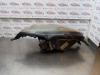 Gebruikte Koplamp links Nissan Micra O175925