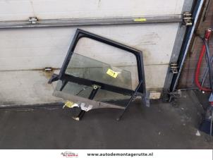 O176022 Gebruikte ruitmechaniek 4deurs links-achter Audi A6