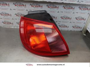O176052 Gebruikte achterlicht links Mitsubishi Colt