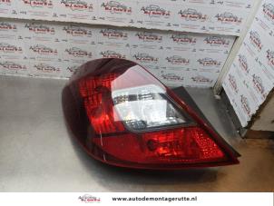O176105 Gebruikte achterlicht links Opel Corsa