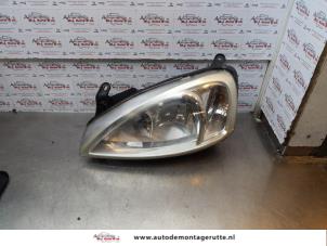 O176564 Gebruikte koplamp links Opel Combo