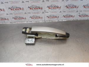 O176680 Gebruikte portiergreep 4deurs links-achter Chevrolet Captiva