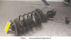 O176897 Gebruikte schokdemperpoot links-voor Volvo V70