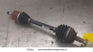 O176909 Gebruikte aandrijfas links-voor Volkswagen Polo