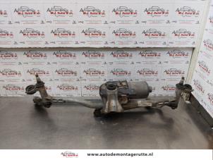 O177054 Gebruikte ruitenwismotor+mechaniek Volkswagen Caddy