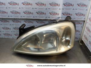 O177148 Gebruikte koplamp links Opel Combo