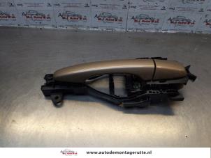 O177351 Gebruikte portiergreep 4deurs links-achter Volvo V40