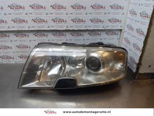 O177848 Gebruikte koplamp links Skoda Superb