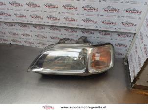 O177911 Gebruikte koplamp links Honda Civic