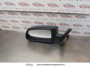 O178001 Gebruikte buitenspiegel links Kia Rio