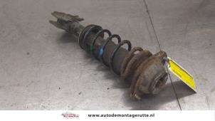 O178424 Gebruikte schokdemperpoot links-voor Suzuki Alto