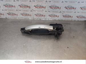 O178590 Gebruikte portiergreep 2deurs links Ford Fiesta