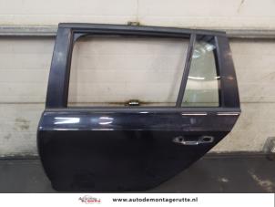 O178773 Gebruikte portier 4deurs links-achter Skoda Octavia