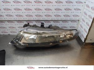 O178884 Gebruikte koplamp links Honda Civic