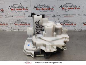 O179094 Gebruikte schuifdeur slotmechaniek rechts Opel Combo