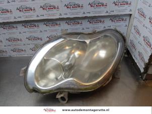 O179096 Gebruikte koplamp links Smart Fortwo