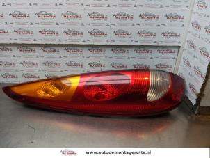 O179112 Gebruikte achterlicht links Nissan Almera Tino