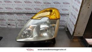 O179233 Gebruikte koplamp links Renault Modus