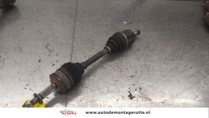 O179365 Gebruikte homokineetas links-voor Opel Corsa