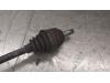Gebruikte Aandrijfas links-voor Opel Corsa O179373