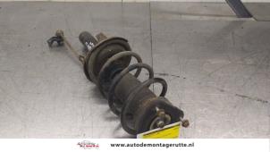 O179390 Gebruikte schokdemperpoot links-voor Ford Focus