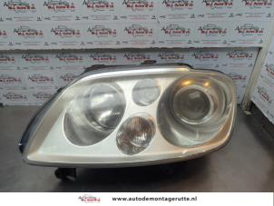 O179501 Gebruikte koplamp links Volkswagen Touran