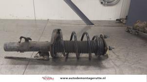 O179534 Gebruikte schokdemperpoot rechts-voor Volvo V40