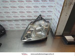 O179645 Gebruikte koplamp links Renault Modus