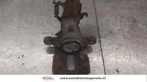 O179855 Gebruikte remklauw (tang) links-achter Nissan Almera