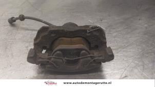 O179890 Gebruikte remklauw (tang) links-voor Volvo V40