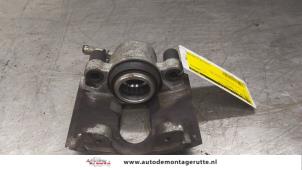 O179893 Gebruikte remklauw (tang) links-voor Ford KA