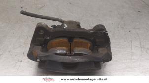 O179934 Gebruikte remklauw (tang) links-voor Seat Leon