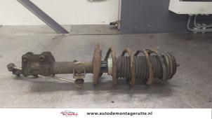 O179960 Gebruikte schokdemperpoot links-voor Fiat Punto Grande