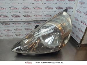 O180092 Gebruikte linker koplamp Honda Jazz