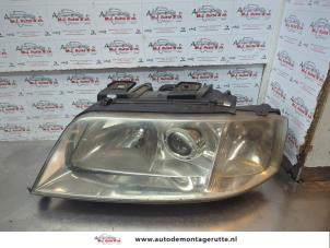 O180100 Gebruikte linker koplamp Audi A6
