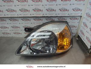 O180177 Gebruikte linker koplamp Kia Rio