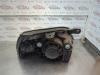 Gebruikte Koplamp links Kia Rio O180177