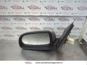 O180214 Gebruikte spiegel buiten links Chevrolet Aveo